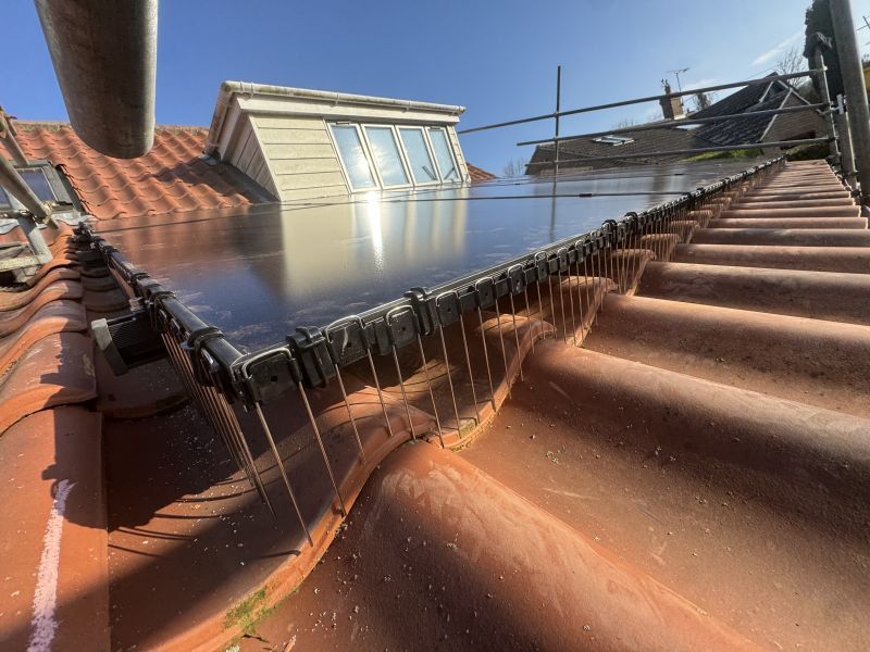 In-roof solar panel edge detail with protection fitted