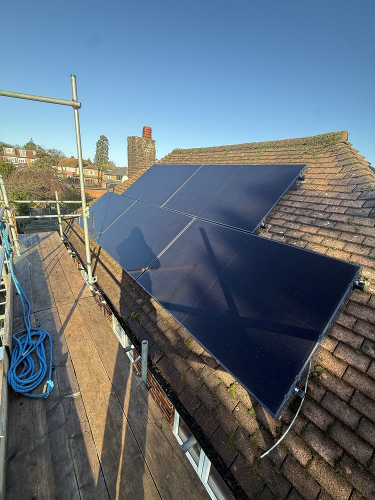 Completed solar panel array on a tiled roof in north London